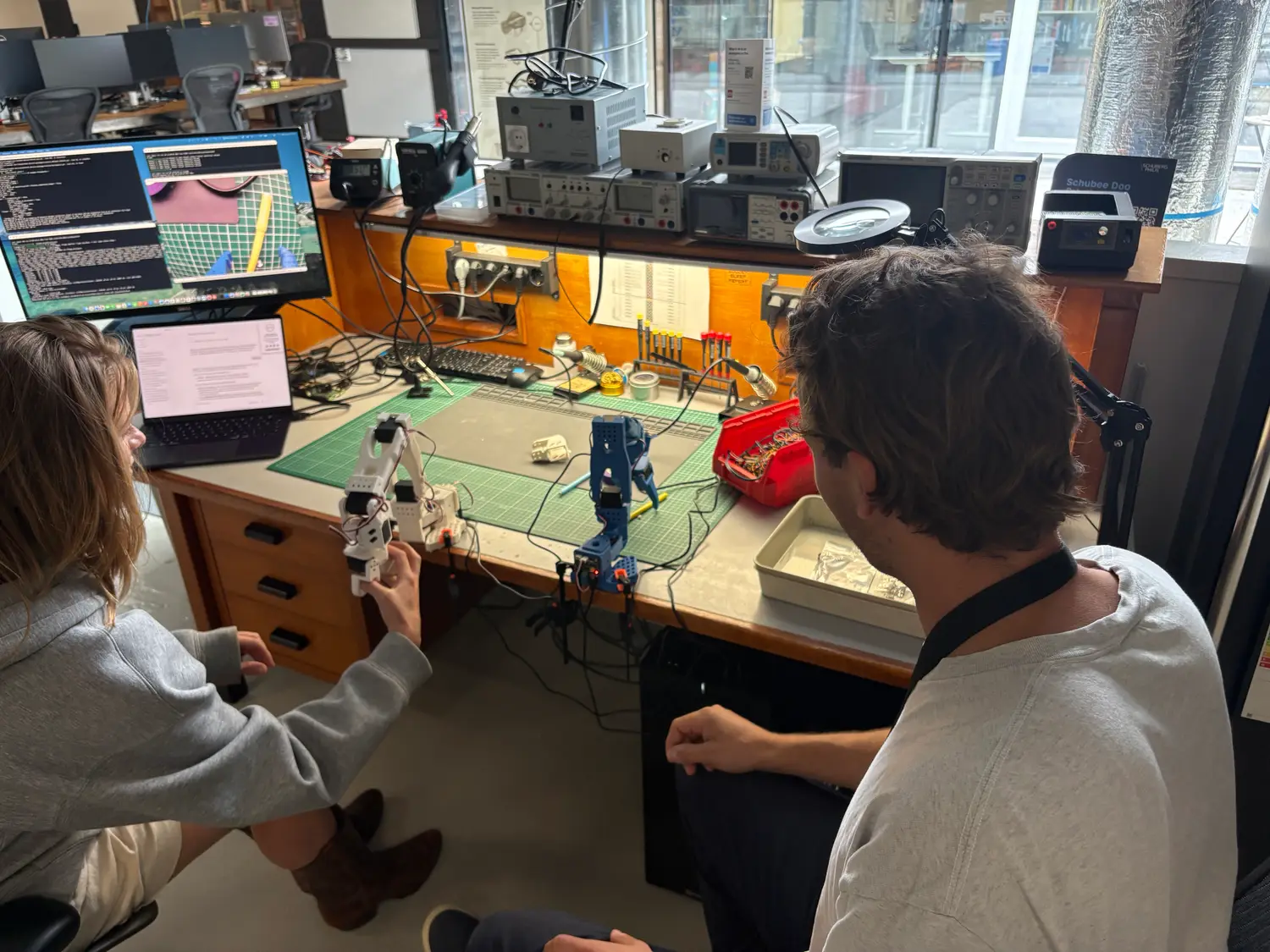 Robot arms mid-test at Lab271